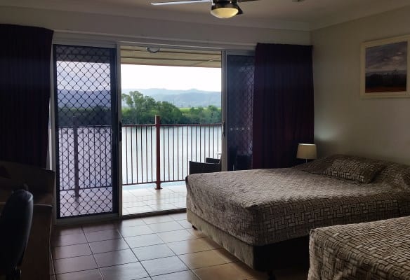 View across Tweed River from inside a motel room